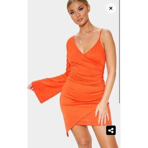 PrettyLittleThing Orange Ruched Side Asymmetrical Hem Bell Sleeve Dress